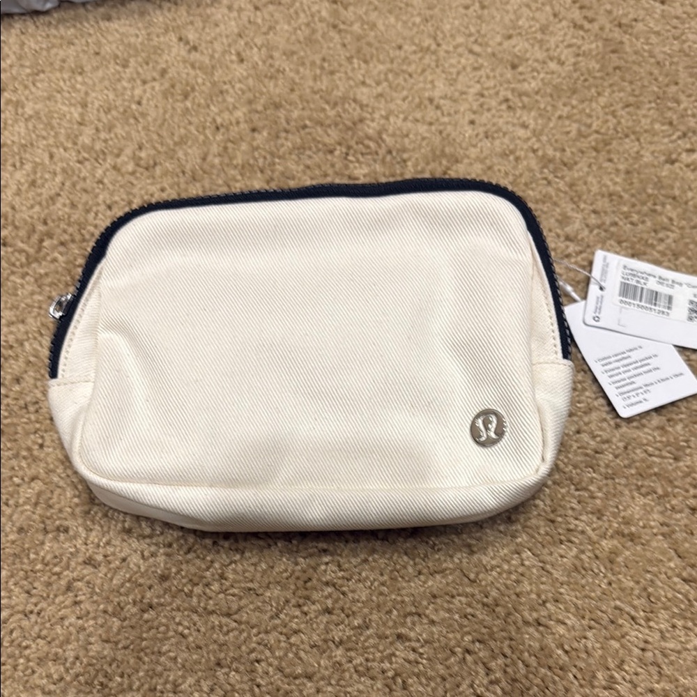 Lululemon Athletica Cream Crossbody Bag with Elegant Simplicity